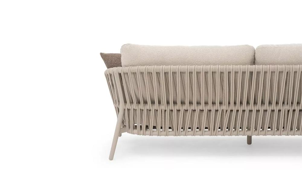 Rope outdoor lounge setting on a covered patio with aluminium frames and neutral cushions