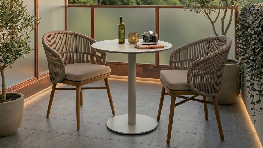 Compact 2-seater bistro set on a small inner-city apartment balcony