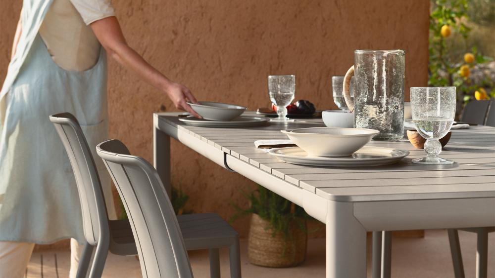 Outdoor dining setting on an Australian alfresco patio at golden hour