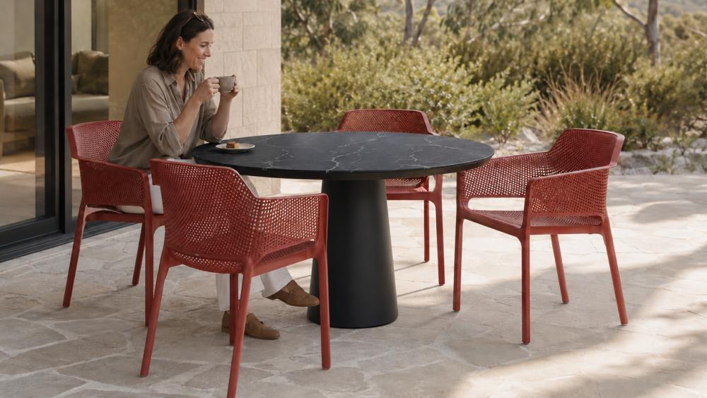 Round, rectangular and extendable outdoor dining tables shown for comparison